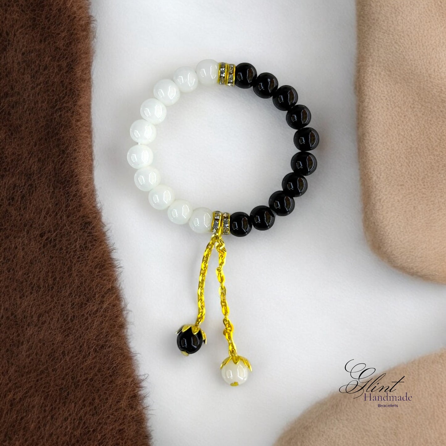 Elegant Beaded Bracelet with Gold Chain Dangle – Black & White Design