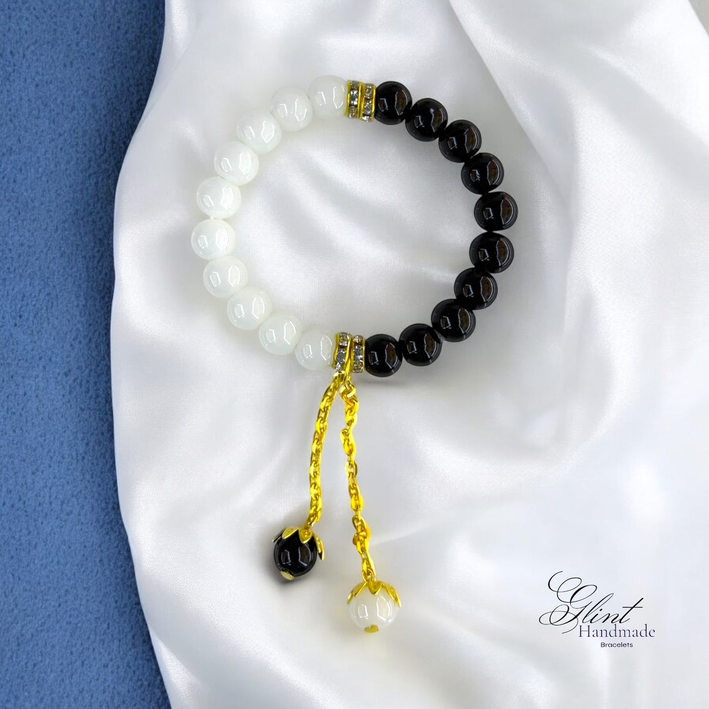 Elegant Beaded Bracelet with Gold Chain Dangle – Black & White Design