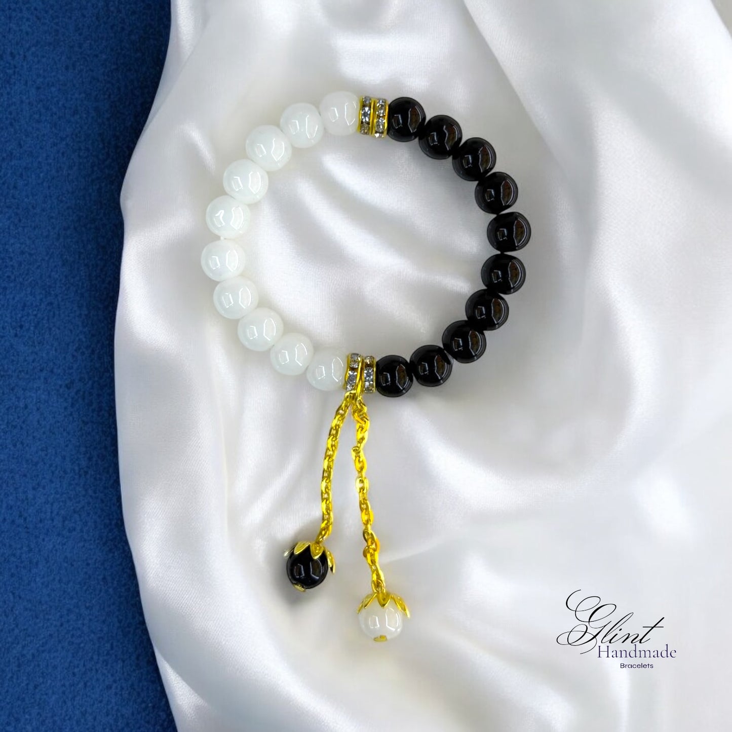 Elegant Beaded Bracelet with Gold Chain Dangle – Black & White Design